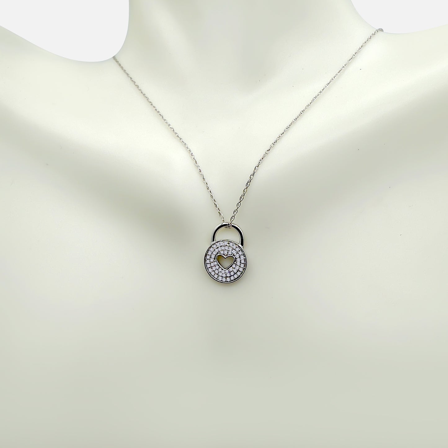 White Gold Round heart cutout Charm .10ct TW with chain included